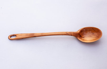 Wooden kitchen utensils stacked view close upの写真素材
