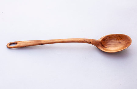 Wooden kitchen utensils stacked view close upの写真素材