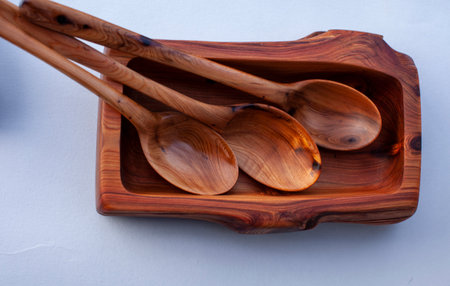 Wooden kitchen utensils stacked view close upの写真素材