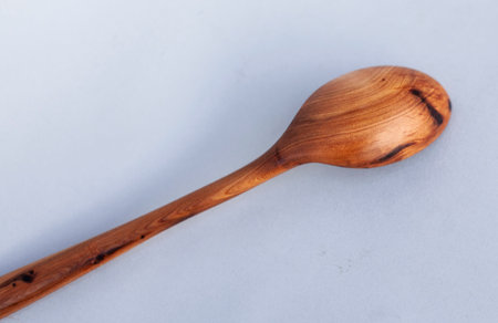 Wooden kitchen utensils stacked view close upの写真素材