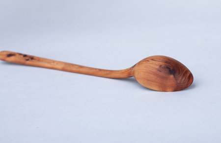 Wooden kitchen utensils stacked view close upの写真素材