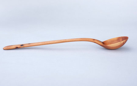Wooden kitchen utensils stacked view close upの写真素材