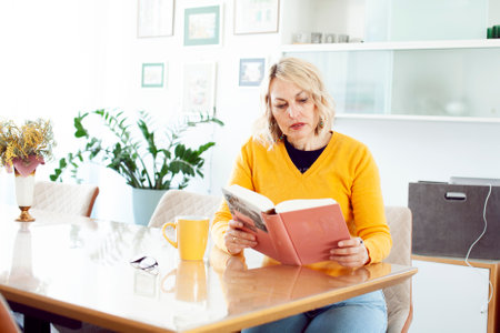 an adult woman working in home interior, lifestyle people conceptの写真素材
