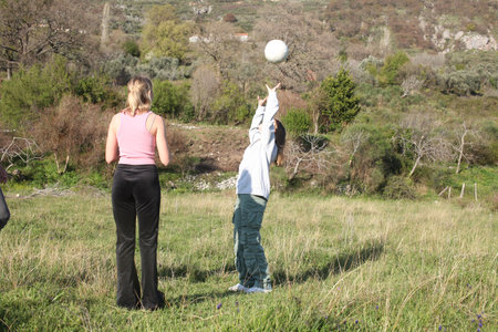 teenage girl playing ball outside, lifestyle people conceptの写真素材