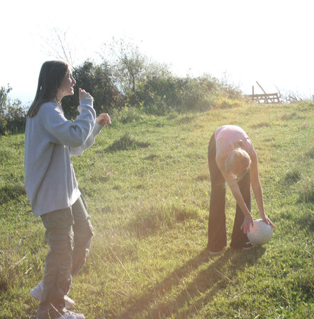 teenage girl playing ball outside, lifestyle people conceptの写真素材