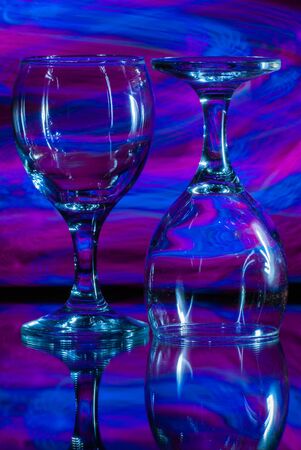 Two glasses on a blue background. Beautiful still lifeの写真素材