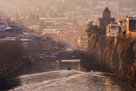 Evening View Of Tbilisi At Colorful Sunset, Georgia. Beautiful Old town at sunset