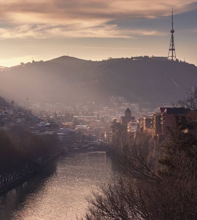 Evening View Of Tbilisi At Colorful Sunset, Georgia. Beautiful Old town at sunsetの写真素材