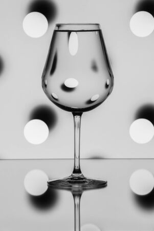 Pattern distortions seen through a glass of water. Still lifeの写真素材