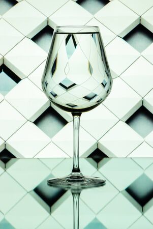 Pattern distortions seen through a glass of water. Still lifeの写真素材