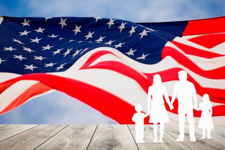 Family in the United States, paper figures concept. People or Family paper shape with flag of the United States of America. USA holiday of Veterans, Memorial, Independence and Labor Dayの写真素材
