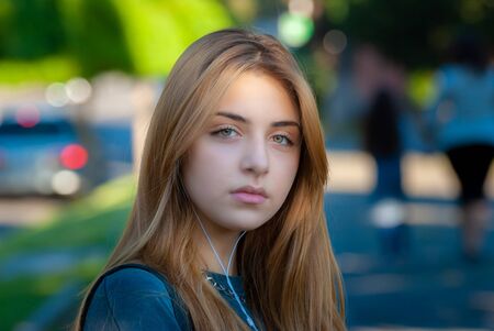 Beautyful teen girl on the street of old European city. Travelの写真素材