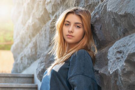 Beautyful teen girl on the street of old European city. Travelの写真素材