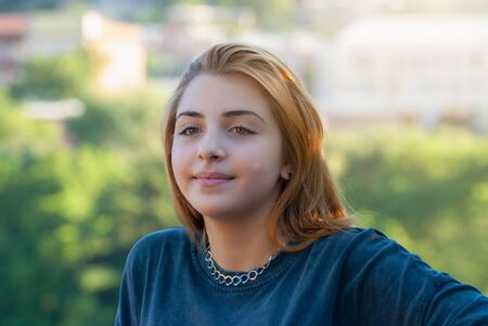 Beautyful teen girl on the street of old European city. Travelの写真素材