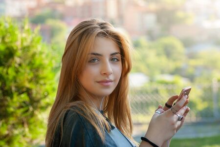 Beautyful teen girl on the street of old European city. Travelの写真素材