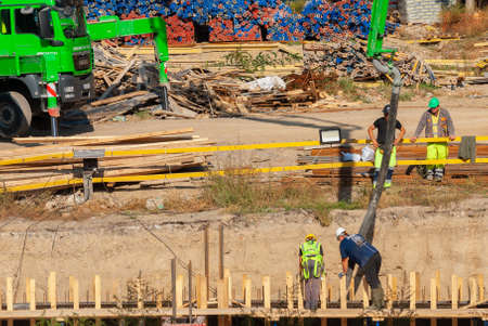 Georgia, Tbilisi - October 27, 2020: The process of building a house. Construction builders. Worker...
