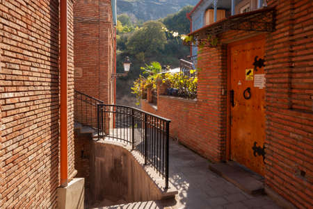 Georgia, Tbilisi - October 23, 2020: View of traditional narrow street of Old Tbilisi.