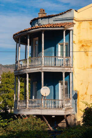 Georgia, Tbilisi - October 23, 2020: Houses with balconies in the historic district of Tbilisi. Georgia. Evening View. Beautiful Old town at sunset.のeditorial素材