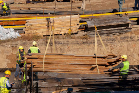 Georgia, Tbilisi - November 8, 2020: The process of building a house. Construction builders. Worker construction process.のeditorial素材