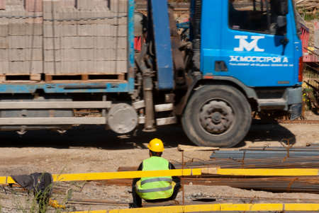 Georgia, Tbilisi - October 8, 2020: The process of building a house. Construction builders. Worker construction process.のeditorial素材