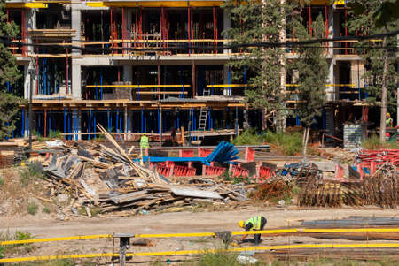 Georgia, Tbilisi - October 8, 2020: The process of building a house. Construction builders. Worker construction process.のeditorial素材