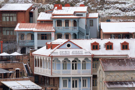 Georgia, Tbilisi - February 25, 2021: Houses with balconies in the historic district of Tbilisi....