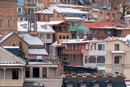 Georgia, Tbilisi - February 25, 2021: Houses with balconies in the historic district of Tbilisi....