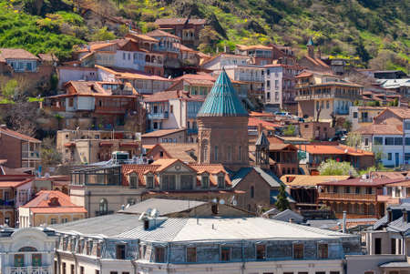 Georgia, Tbilisi - April 15, 2021: Houses with balconies in the historic district of Tbilisi....