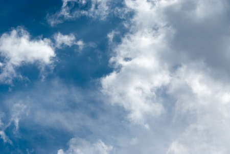 Blue sky background with clouds. Natural background.の写真素材