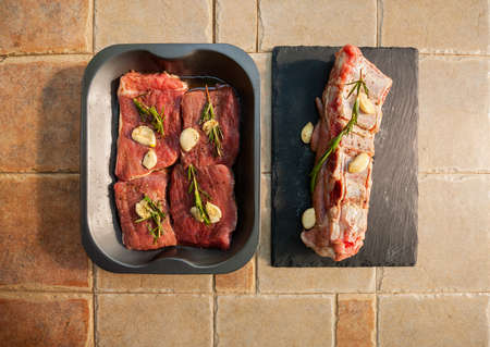 large steaks. fresh pieces of meat. Spices for meat.の写真素材