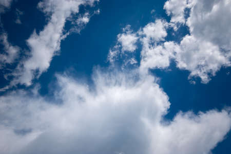 Blue sky background with clouds. Natural background.の写真素材