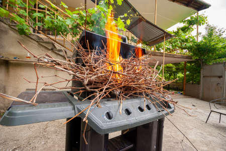 Empty Hot Barbecue Grill With Bright Flame.の写真素材
