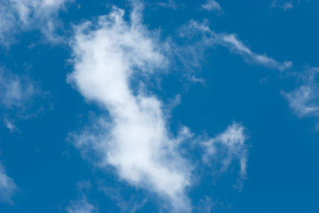 Blue sky background with clouds. Natural background.の写真素材