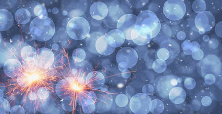 Burning sparklers on abstract snowy background. New Year celebration. 3d illustration.の写真素材