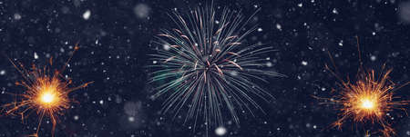 Burning sparklers on abstract snowy background. New Year celebration. 3d illustration.の写真素材
