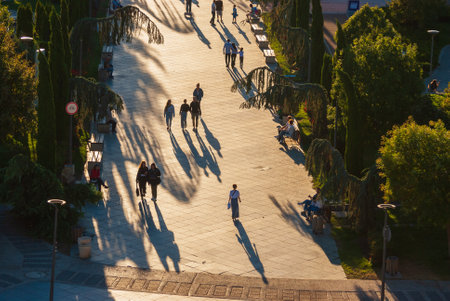 Georgia, Tbilisi - September 14, 2022: People walk in the city park.のeditorial素材