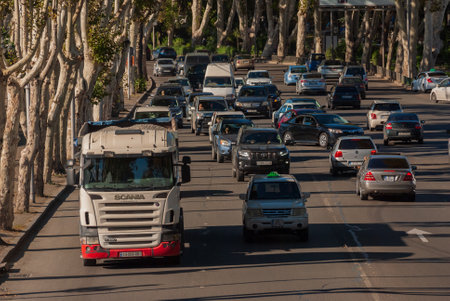 Georgia, Tbilisi - September 25, 2022: Traffic on city street.のeditorial素材