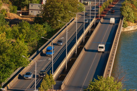 Georgia, Tbilisi - September 14, 2022: Traffic on city street.のeditorial素材