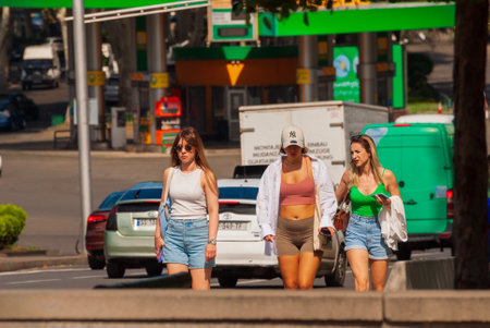Georgia, Tbilisi - September 17, 2022: Tourists walking on busy city street.のeditorial素材