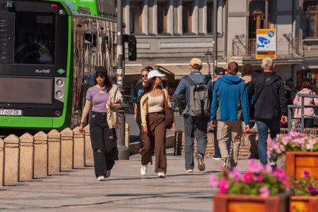 Georgia, Tbilisi - September 25, 2022: Crowd of anonymous people walking on busy city street.のeditorial素材