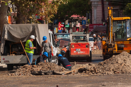Georgia, Tbilisi - September 17, 2022: Construction builders. Worker construction process.のeditorial素材