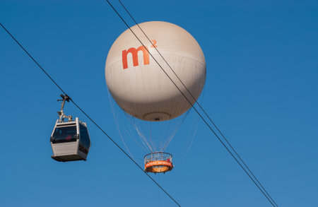 Georgia, Tbilisi - October 30, 2022: Air excursion balloon and cable car.のeditorial素材