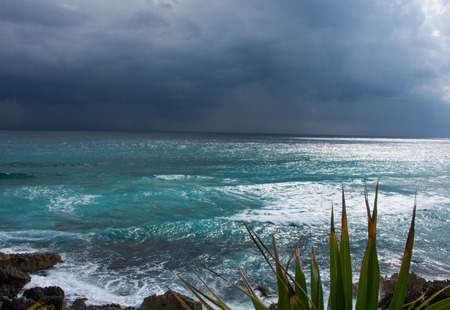 Approaching thunderstorm on easter shore of Cozumel, Mexicoの写真素材