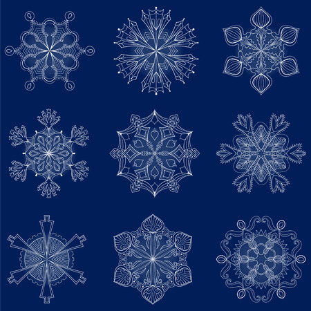 Vector vintage snowflake set in zentangle style. 9 original isolated snow flakes for Christmas, New Year decoration. Hand drawn doodle objects. Eps10.のイラスト素材