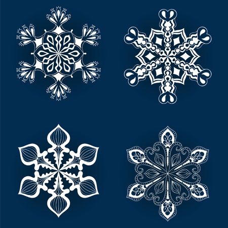 Vector vintage snowflake set in zentangle style. White original snow flakes for Christmas, New Year decoration. Hand drawn isolated doodle objects.のイラスト素材