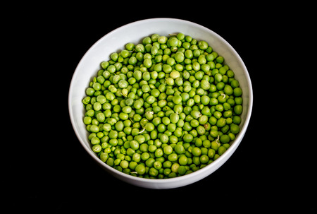 Green Peas in a White Bowlの写真素材