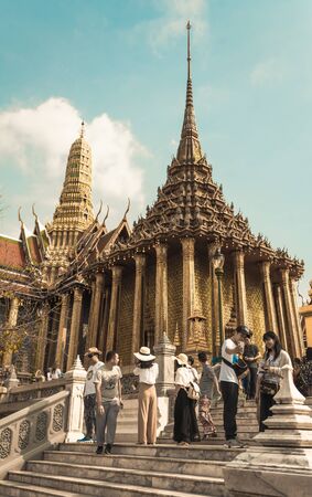 Bangkok, Thailand - January 26, 2018: Tourists visiting the Phra Mondop in Wat Phra Kaew (Wat Phra Sri Rattana Satsadaram) in Bangkok, Thailand.のeditorial素材