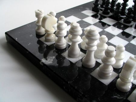 Chess pieces in black and white