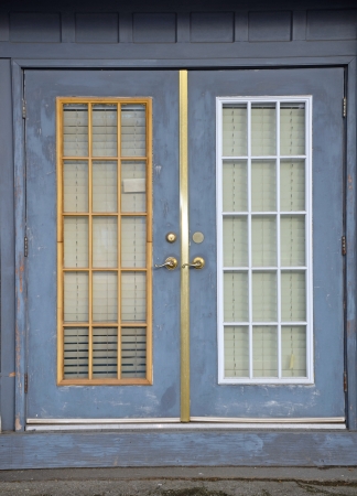 Old blue window doorsの写真素材