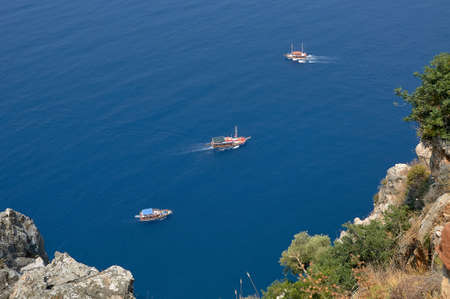 Small ships in the blue sea